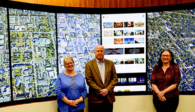The ability of the recently redesigned Encyclopedia of Alabama to scale to a variety of screen sizes is demonstrated by the Encyclopedia of Alabama staff on the Digital Wall, a large, interactive digital display at Auburn University’s Ralph Brown Draughon Library.