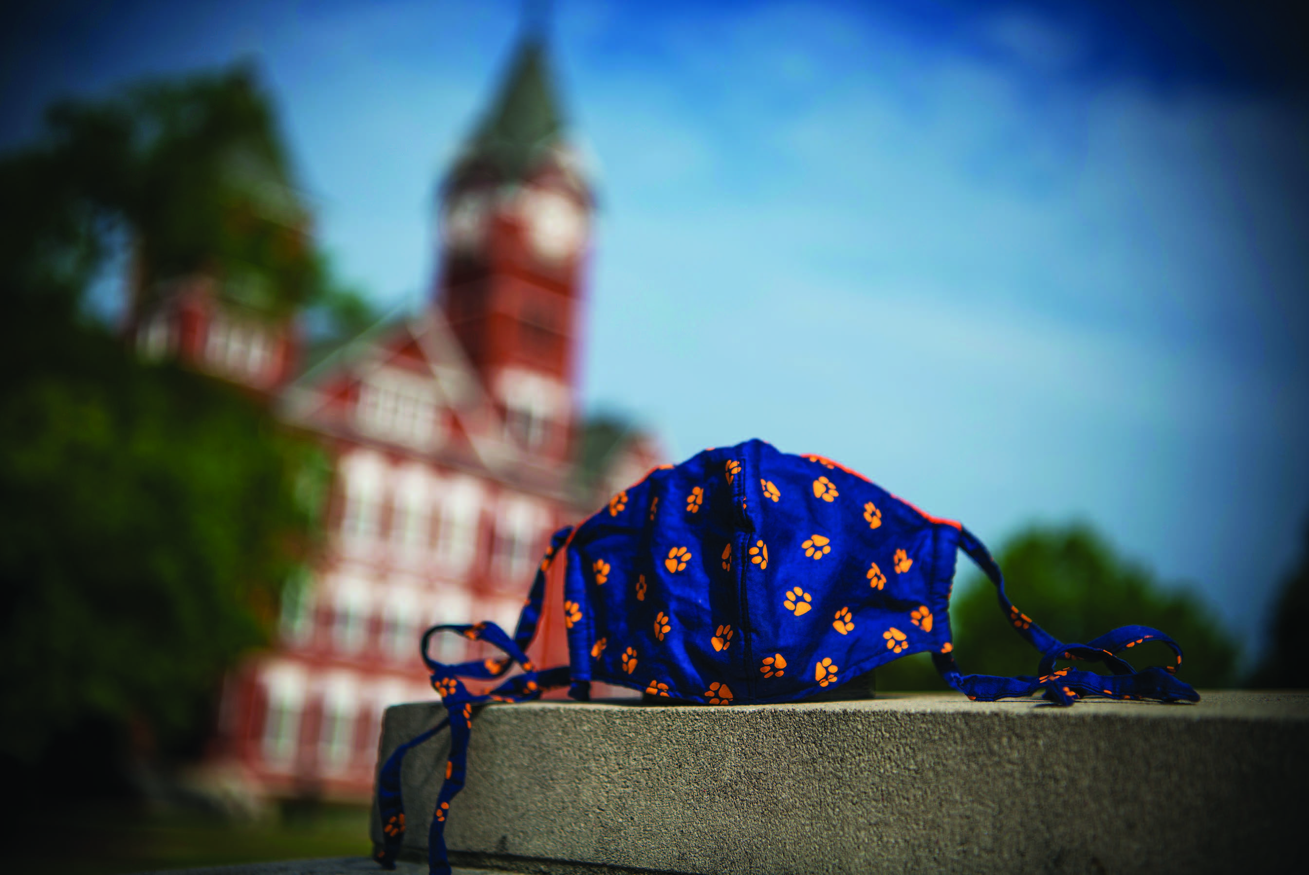 Orange and Blue facemask with blurred Samford hall in background