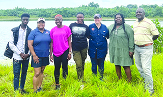 Felicia Tuggle, assistant professor, social work, and Mollie Smith, fisheries department with UFWH chapter participants.