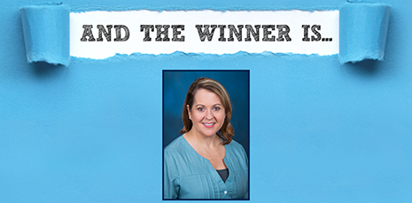 Blue background with text 'And the winner is...' with headshot of Linda Gibson-Young