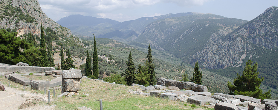 Delphi archeological site with mountains