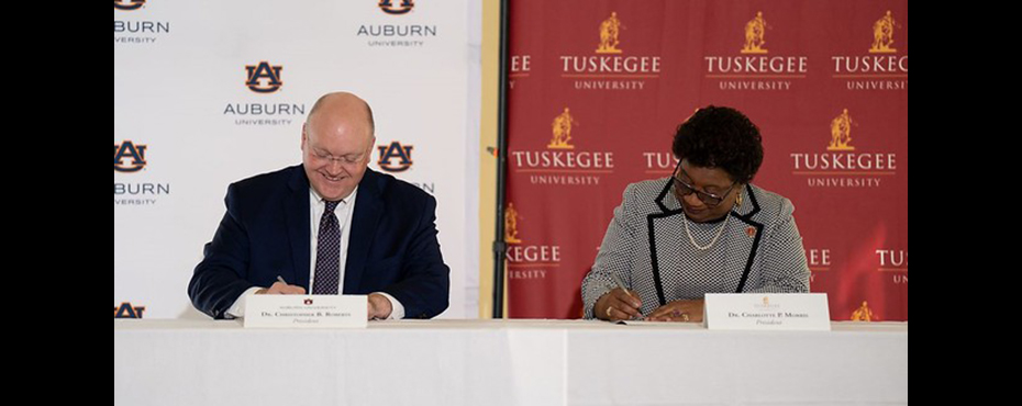 Auburn University President Christopher B. Roberts and Tuskegee University President Charlotte P. Morris signed a Memorandum of Understanding Monday that will align the two land-grant institutions on community outreach initiatives that will address racial and health disparities in Alabama communities. Photo by Stefan Smith, Tuskegee University