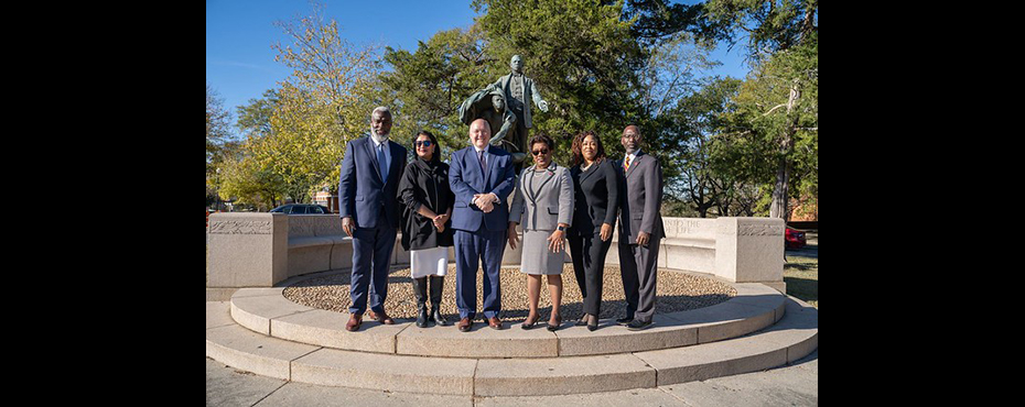 Auburn University and Tuskegee University are joining forces to expand outreach initiatives designed to improve access to health care in Alabama's underrepresented communities. Pictured, from left to right: Royrickers Cook, Auburn's vice president and associate provost for University Outreach; Auburn Interim Provost Vini Nathan; Auburn President Christopher B. Roberts; Tuskegee University President Charlotte P. Morris; Auburn University Outreach Director of Faculty Engagement Chippewa Thomas; and Tuskegee University Provost S. Keith Hargrove. Photo by Stefan Smith, Tuskegee University