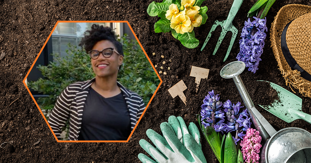 smiling African American woman in a hexagonal frame next to soil with flowering plants and garden tools