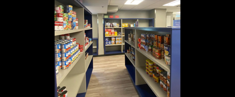Shelves of food at the Food Pantry in Lupton Hall.