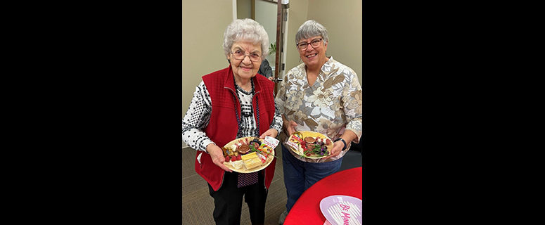 Two women pictured at an event hosted by Auburn Parks and Recreation