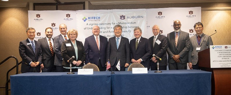 Auburn University leadership team pictured with members of Kitech.